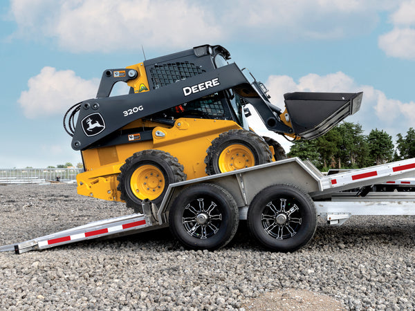 picture of skidsteer on Impte trailer